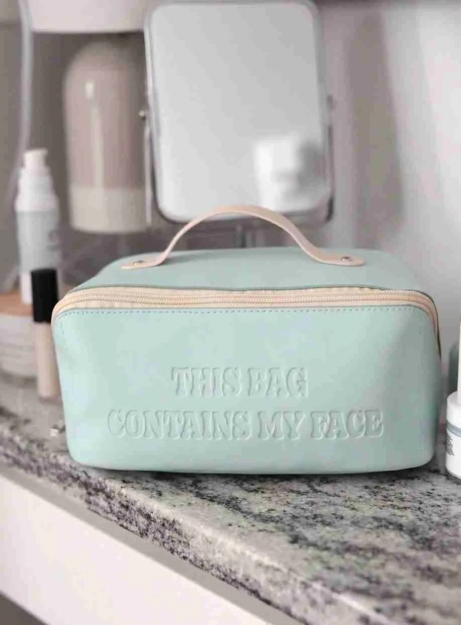 Blue Hold All Triangle Make Up Bag